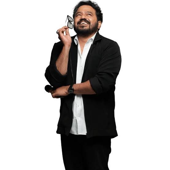 Mentalist Aathi smiling candidly