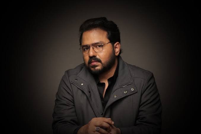 Mentalist Aathi in a moody studio portrait